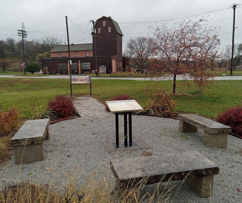 Crossroads to the West Marker with the Florence Mill in the distance. Click for full size. Crossroads to the West Marker with the Florence Mill in the distance image. Click for full size.
