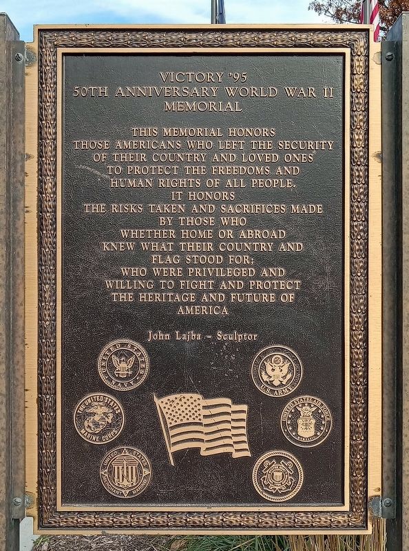 Victory '95 plaque at southwest corner of memorial image. Click for full size.