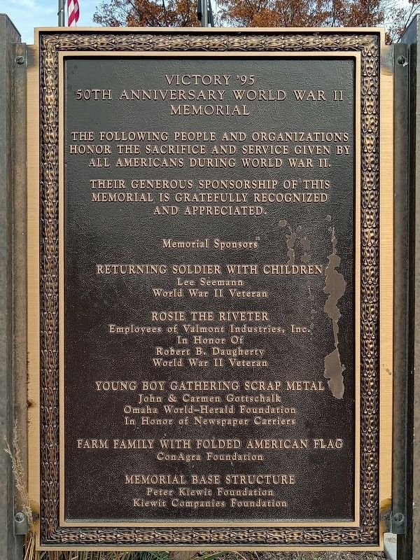 Victory '95 plaque at southeast corner of memorial image. Click for full size.