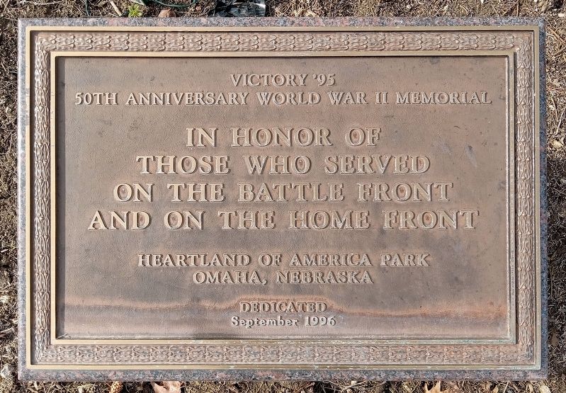 Victory '95 plaque at south approach to memorial image. Click for full size.