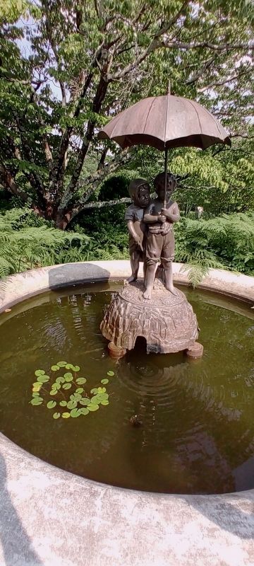 "Out in the Rain" statue image. Click for full size.