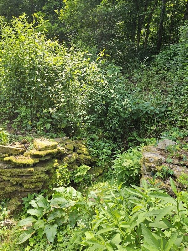 "The same stacked stones still visible today" of the spring image. Click for full size.
