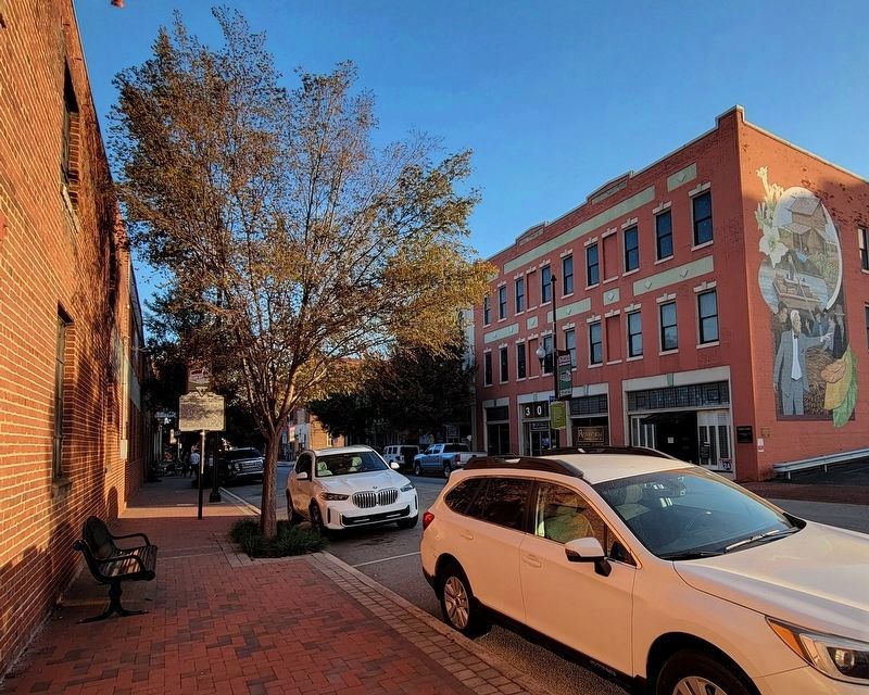 Tobacco Warehouse District Marker and nearby Tobacco Heritage Mural. Click for full size. Tobacco Warehouse District Marker and nearby Tobacco Heritage Mural image. Click for full size.