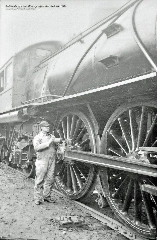 Marker detail: Railroad engineer oiling up before the start, ca. 1905. Click for full size. Marker detail: Railroad engineer oiling up before the start, ca. 1905 image. Click for full size.