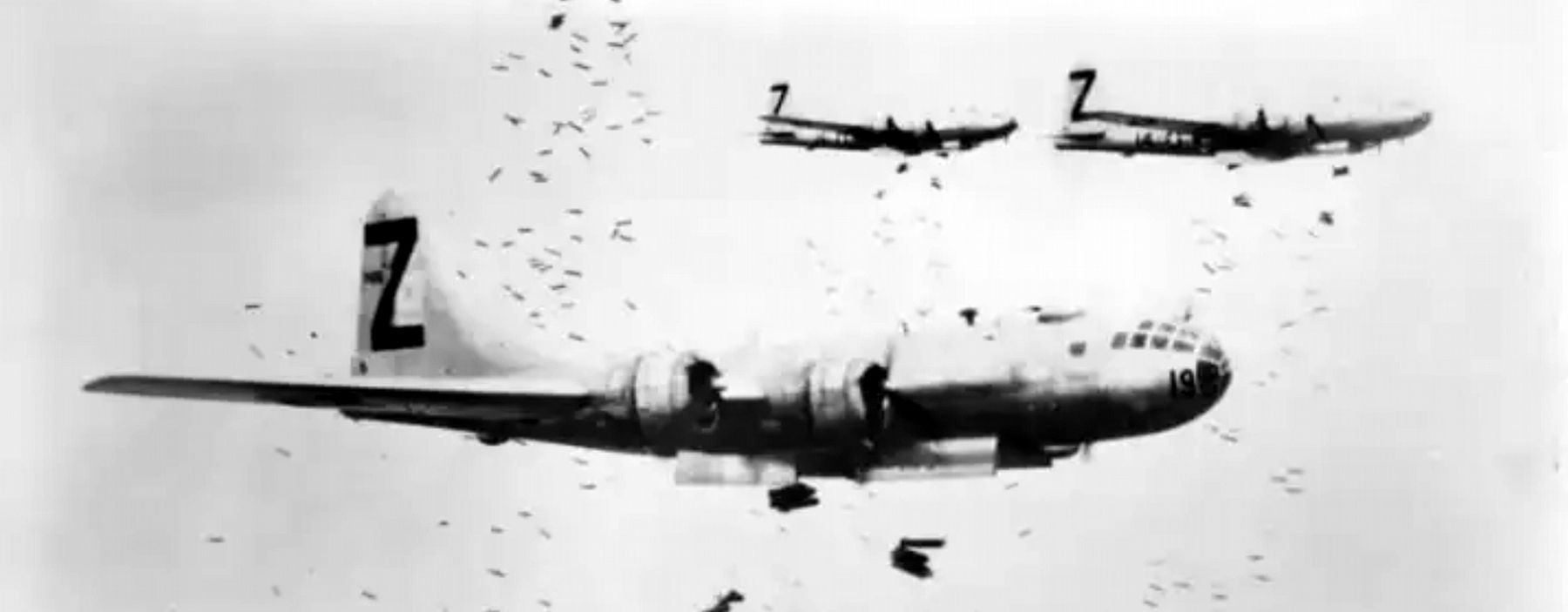 B-29 Superfortresses from 500th BG, 73rd BW of 20th Air Force dropping incendiary bombs over Japan.. Click for full size. B-29 Superfortresses from 500th BG, 73rd BW of 20th Air Force dropping incendiary bombs over Japan. image. Click for full size.