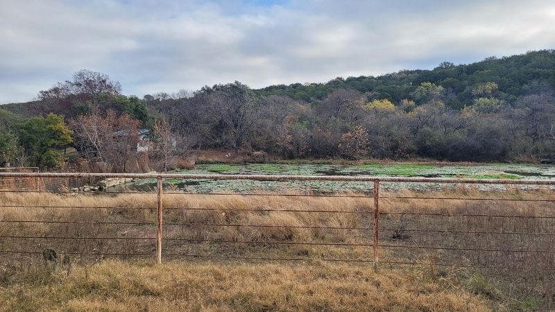 The view of the old mill pond behind the marker image. Click for full size.