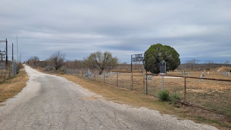 The view of Terry Cemetery and Marker along the road image. Click for full size.