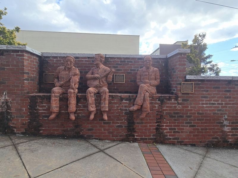 Wide view of Tommy Jarrell (left), Fred Cockerham & Ralph Epperson, and markers image. Click for full size.
