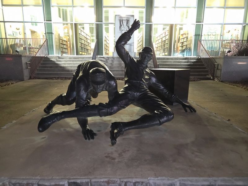 Full view of Tyrus Raymond Cobb statue in front of the Royston Public Library image. Click for full size.