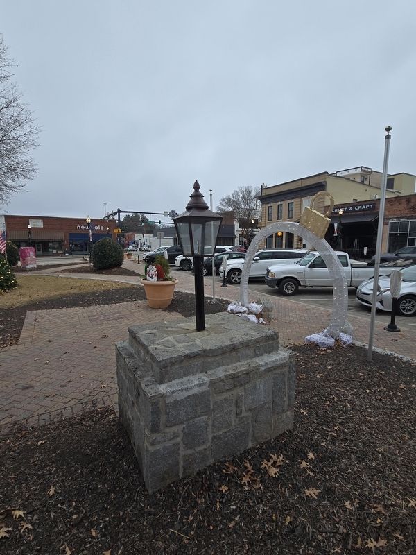 "Flame of Freedom" Marker at intersection of sidewalk & center walk, south side of McDonough Square. Click for full size. "Flame of Freedom" Marker at intersection of sidewalk & center walk, south side of McDonough Square image. Click for full size.