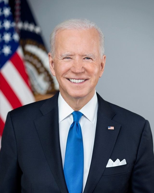 Official portrait of President Joe Biden, taken in the Library room at the White House image. Click for more information.