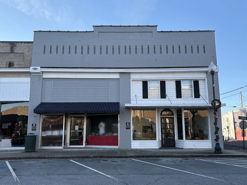 Former site of Barnwell and Woolard Department Store Marker (marker on left). Click for full size. Former site of Barnwell and Woolard Department Store Marker (marker on left) image. Click for full size.