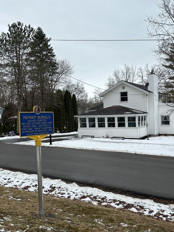 Patriot Burials marker in front of the cemetery fence. 97 Grove Street residence in the background. image. Click for full size.