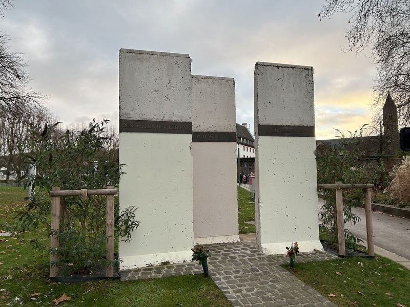 Sections of the Berlin Wall on Display next to the Marker. image. Click for full size.
