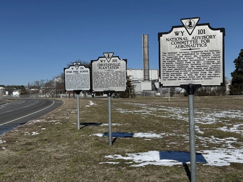 Syms Free School Marker with other adjacent markers. Click for full size. Syms Free School Marker with other adjacent markers image. Click for full size.