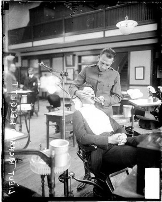 U.S. Army dentist working on a patient image. Click for full size.