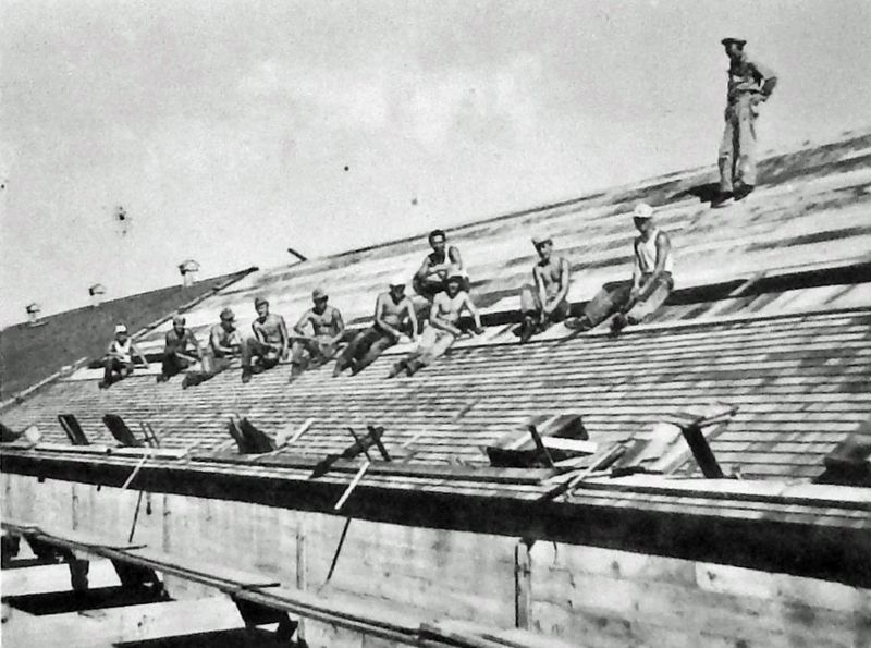 Marker detail: Prisoners work on re-shingling a building image. Click for full size.