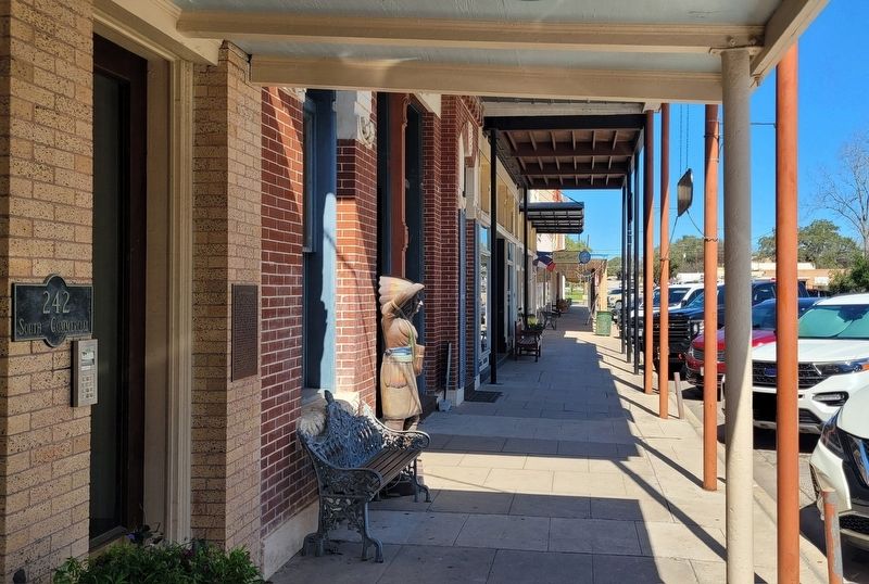 The view of the W.A. Pettus Building Marker along the sidewalk. Click for full size. The view of the W.A. Pettus Building Marker along the sidewalk image. Click for full size.