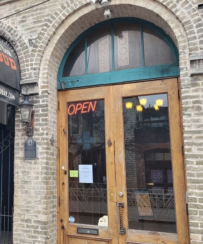 The entrance to the building and Paggi Carriage Shop Marker image. Click for full size.