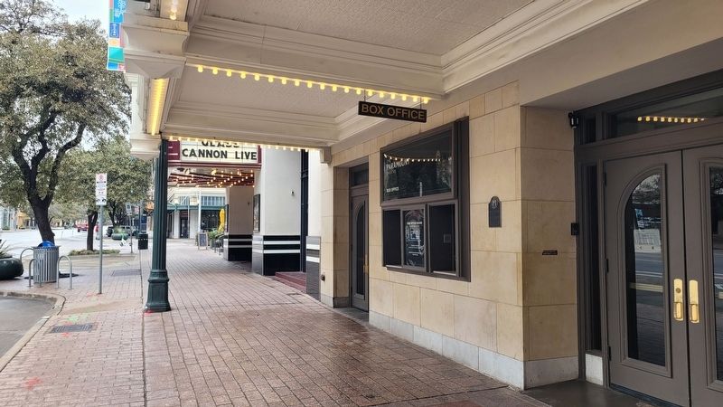 The view of the Paramount Theatre and Marker along the sidewalk. Click for full size. The view of the Paramount Theatre and Marker along the sidewalk image. Click for full size.