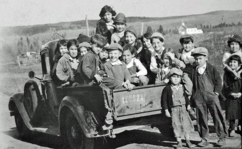 Marker detail: Ojibwe children pile into a truck to take a ride on the new highway. Click for full size. Marker detail: Ojibwe children pile into a truck to take a ride on the new highway image. Click for full size.