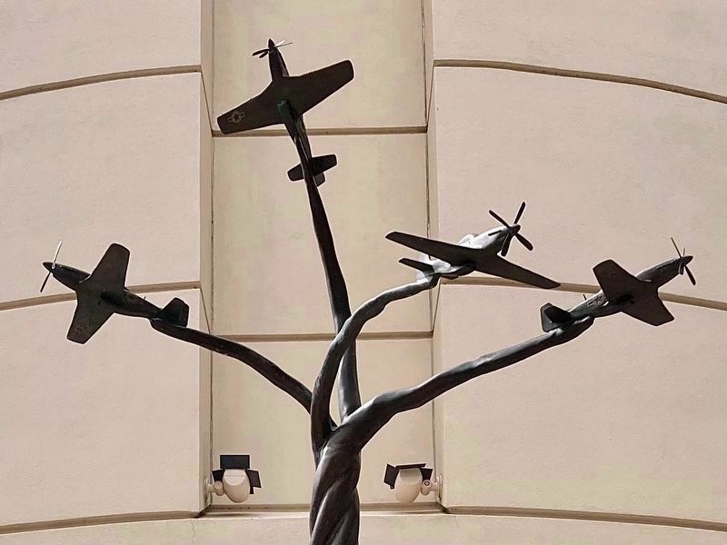 Tuskegee Airmen Statue with P-51 Mustangs image. Click for full size.