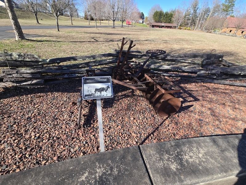 Disk Harrow and Marker located near the museum parking lot. Click for full size. Disk Harrow and Marker located near the museum parking lot image. Click for full size.