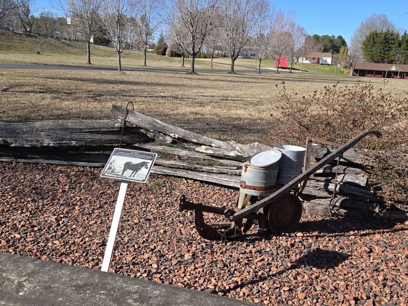 Corn Planter and Marker looking towards museum driveway. Click for full size. Corn Planter and Marker looking towards museum driveway image. Click for full size.