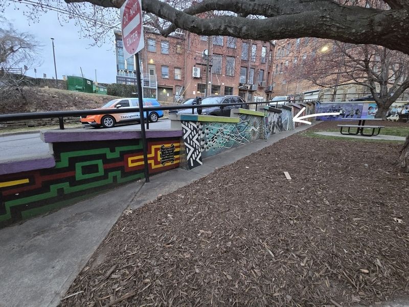 Left side of the Triangle Park Mural. Marker indicated by arrow. image. Click for full size.