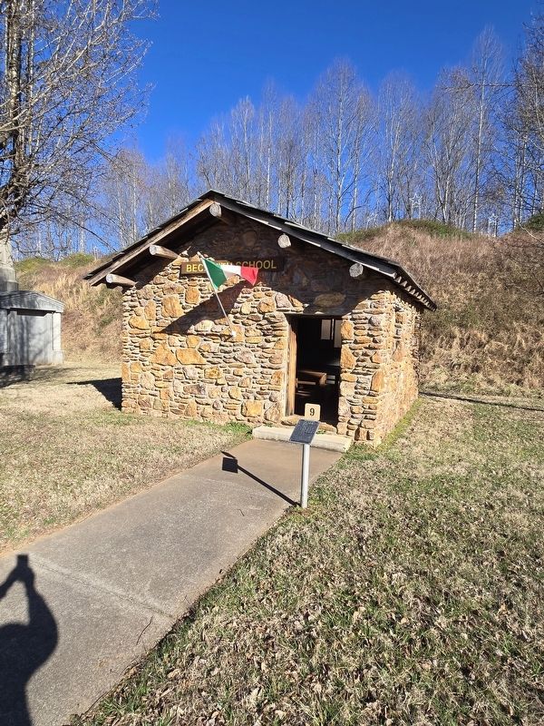 Beckwith School and Marker. The flag was donated from a Beckwith School in Italy. image. Click for full size.
