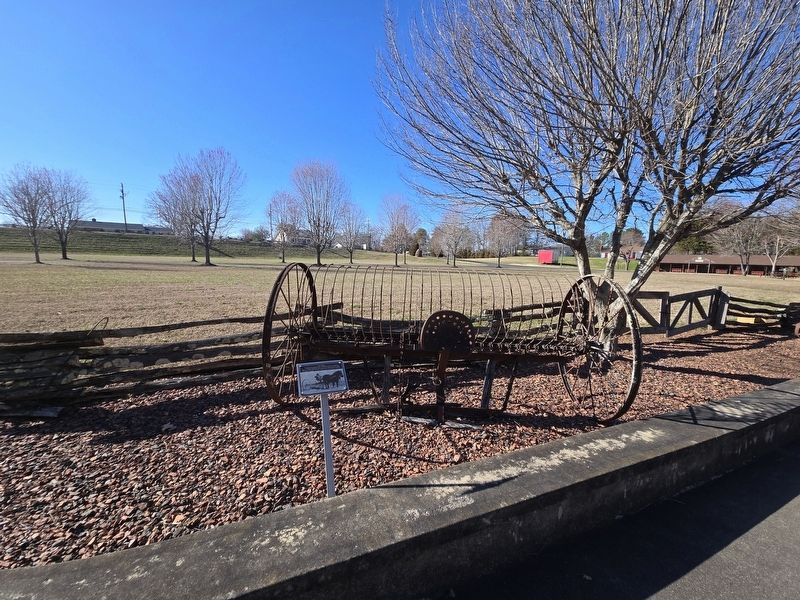 Hay Rake and marker. Museum driveway and field are in the background image. Click for full size.