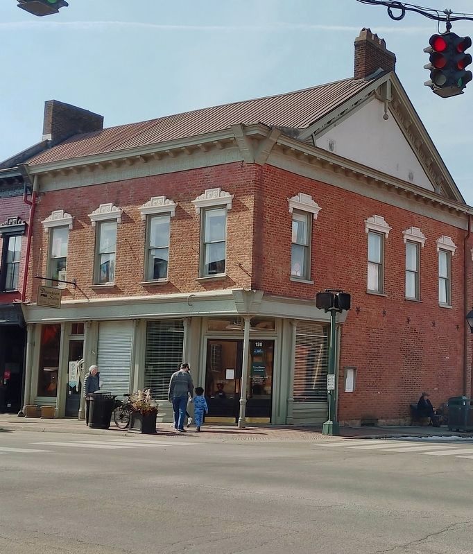 Beall's Row Building. Marker is to the right of the corner entrance by the crosswalk signal image. Click for full size.