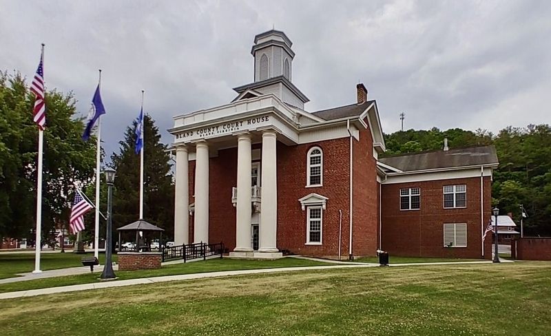 Bland County Courthouse. Bell and Marker are at the gazebo near the flags image. Click for full size.