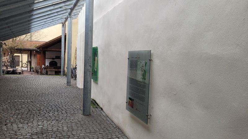 The view of the marker along the wall and behind the support pole image. Click for full size.