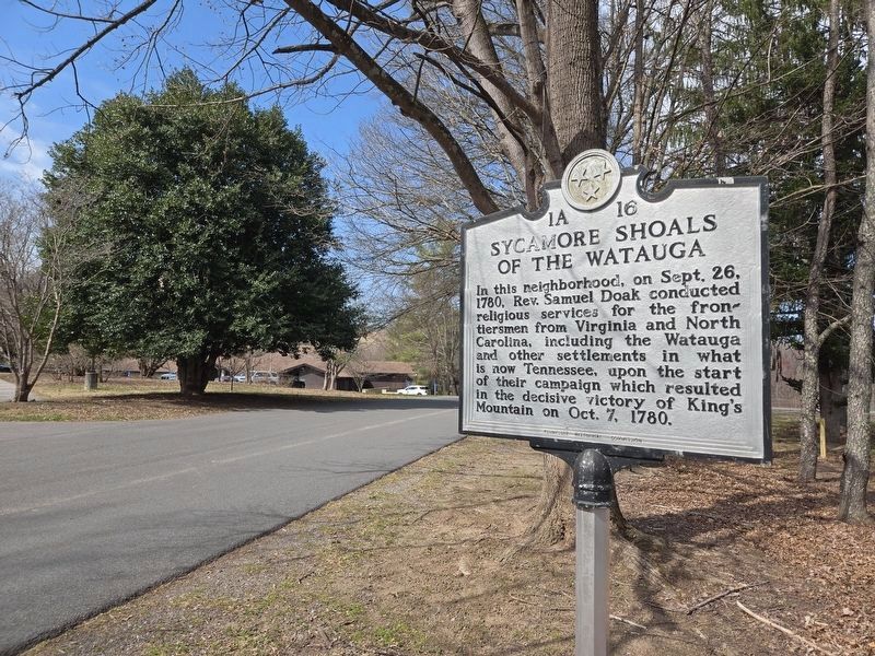Sycamore Shoals of the Watauga Marker at its new location. Visitors Center in the background image. Click for full size.