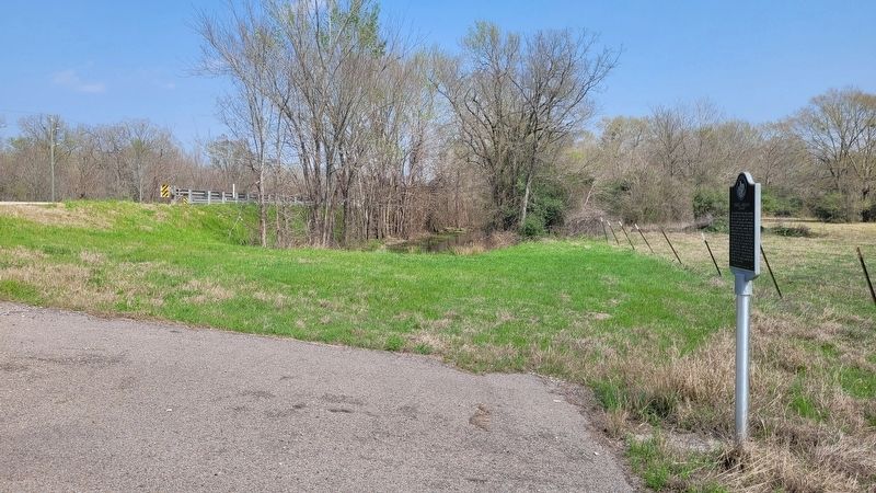 The view of the Daniel Larrison Marker along the highway image. Click for full size.