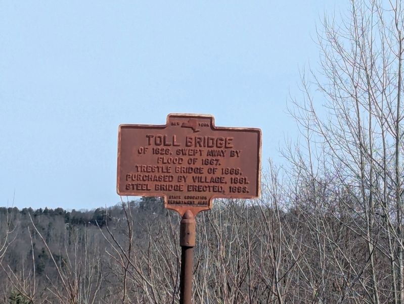 Toll Bridge Marker photo taken from across the highway. Click for full size. Toll Bridge Marker photo taken from across the highway image. Click for full size.