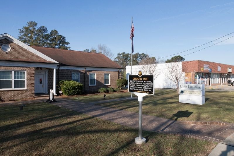 Loris Public Library and the Chicken Bog Marker. Click for full size. Loris Public Library and the Chicken Bog Marker image. Click for full size.