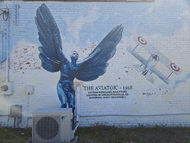 Left panel of Flying for France mural - "The Aviator" sculpture image. Click for full size.