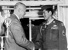 President Dwight D. Eisenhower congratulates SSG Miyamura after awarding him the Medal of Honor. image. Click for full size.