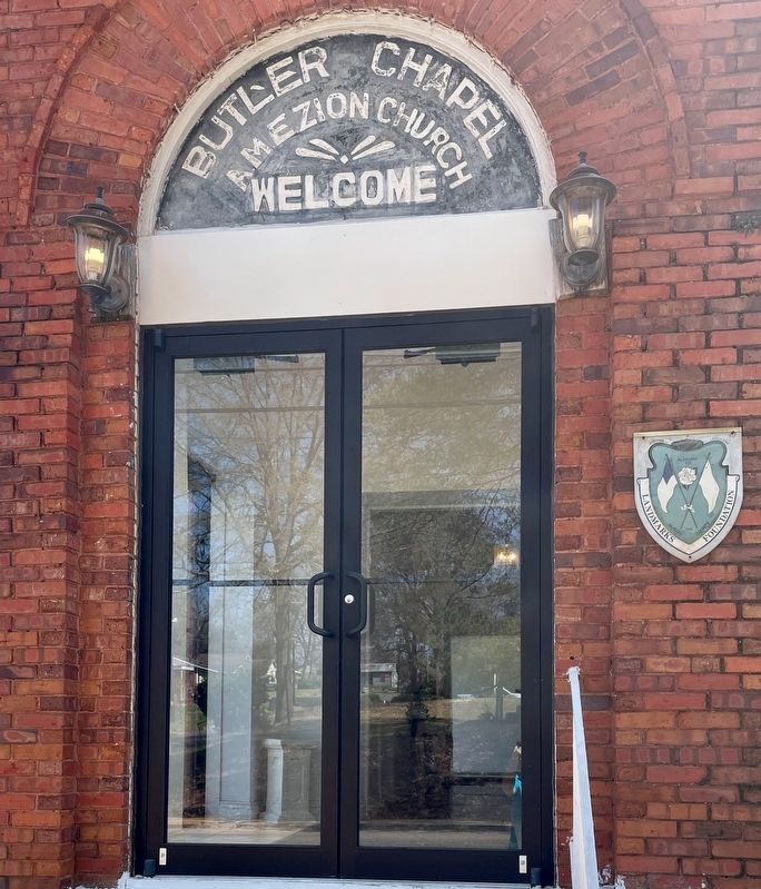 Church entrance door & Butler County Historic Landmark sign.. Click for full size. Church entrance door & Butler County Historic Landmark sign. image. Click for full size.