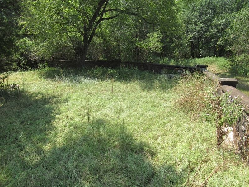 Part of the four foot high octagonal wall builded by the WPA image. Click for full size.