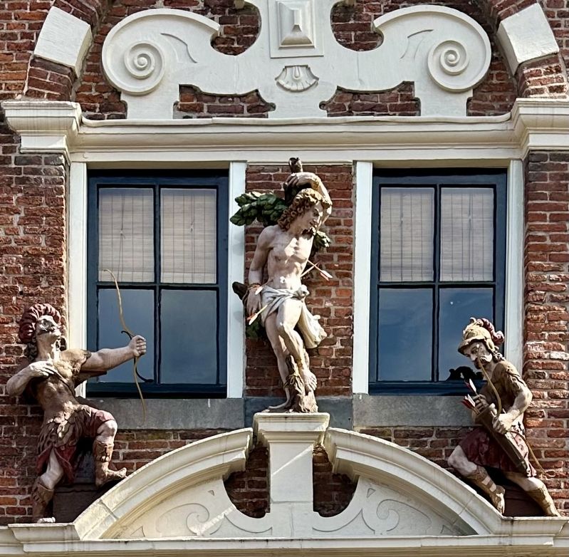 Tableau above entrance - Saint Sebastian and two marksmen image. Click for full size.