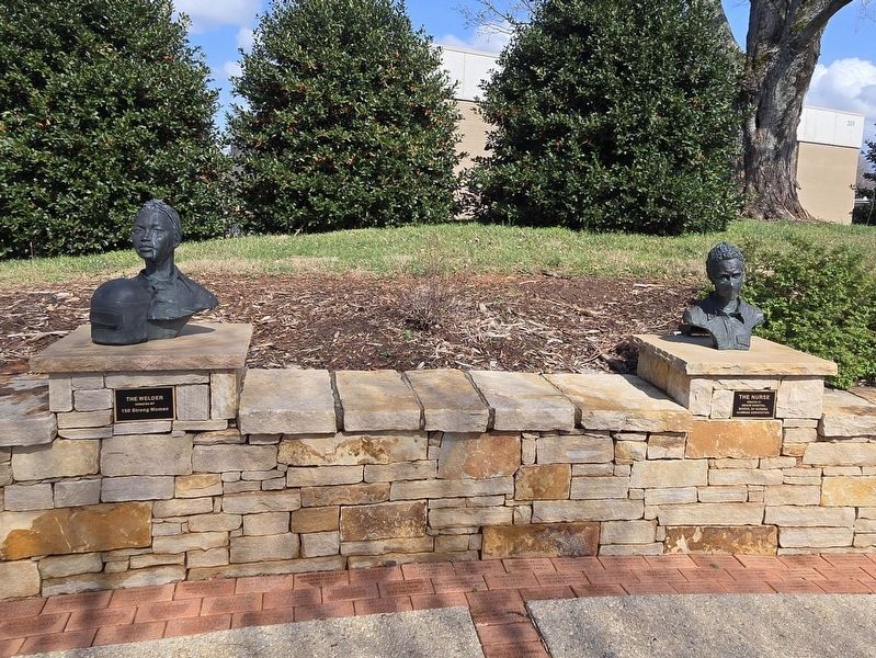 The Welder and the Nurse, part of the Burke County WWII Victory Plaza. Click for full size. The Welder and the Nurse, part of the Burke County WWII Victory Plaza image. Click for full size.