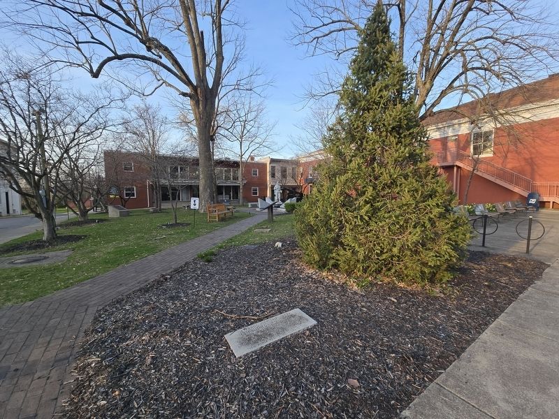 Veterans Memorial Park marker in the planter next to Main Street sidewal. Park is in the background. Click for full size. Veterans Memorial Park marker in the planter next to Main Street sidewal. Park is in the background image. Click for full size.