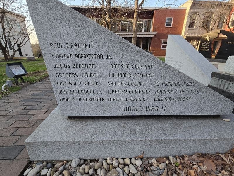 World War II, east side of the sculpture, side one. Click for full size. World War II, east side of the sculpture, side one image. Click for full size.