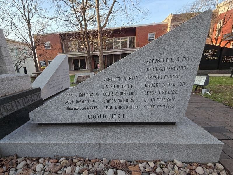 World War II, west side of the sculpture, side one. Click for full size. World War II, west side of the sculpture, side one image. Click for full size.