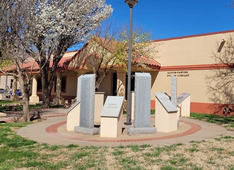 The view of the Curry County Veterans Memorial in front of the library. Click for full size. The view of the Curry County Veterans Memorial in front of the library image. Click for full size.