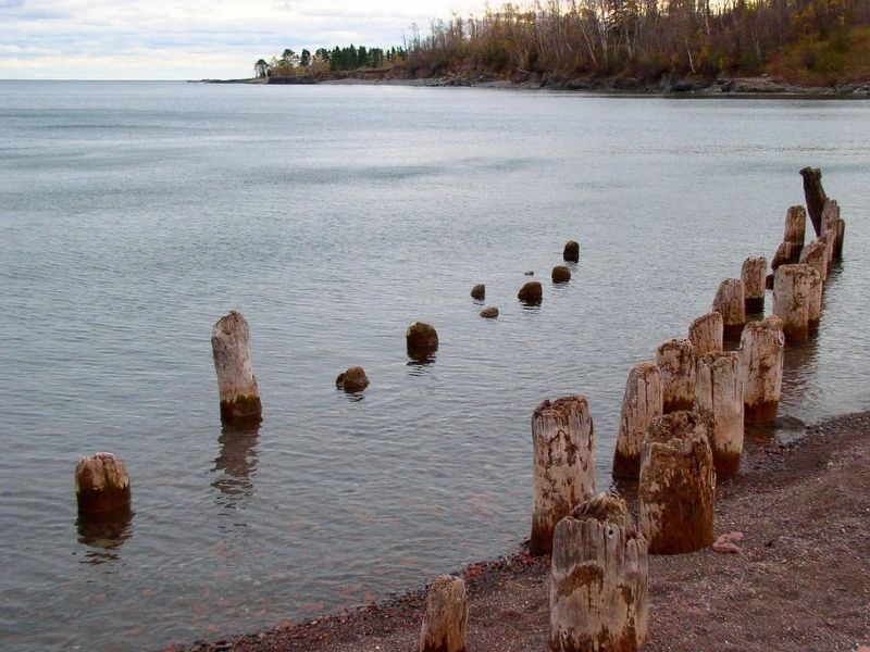 Remains of the pilings at the beach across the highway. Click for full size. Remains of the pilings at the beach across the highway image. Click for full size.