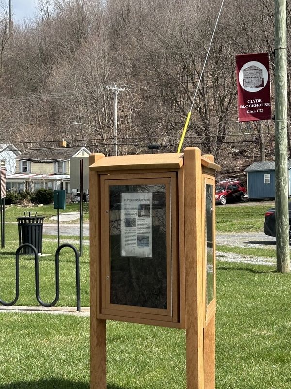 Facing away from the marker towards the parking lot and NY-31. image. Click for full size.